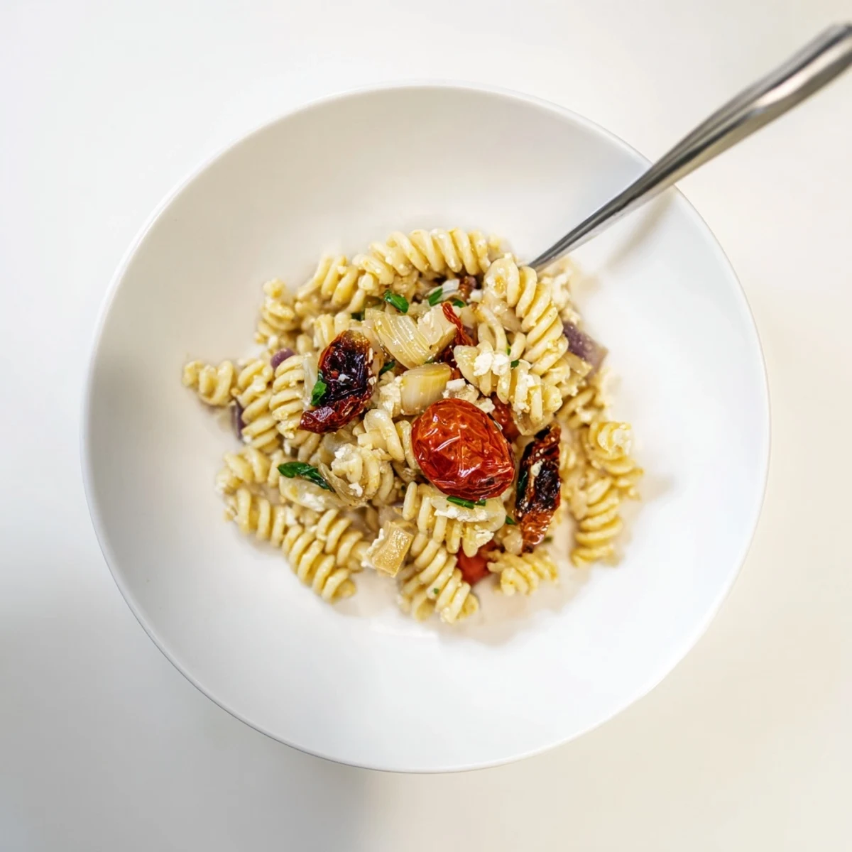Delicious Baked Feta Pasta served warm, drizzled with olive oil and extra herbs.