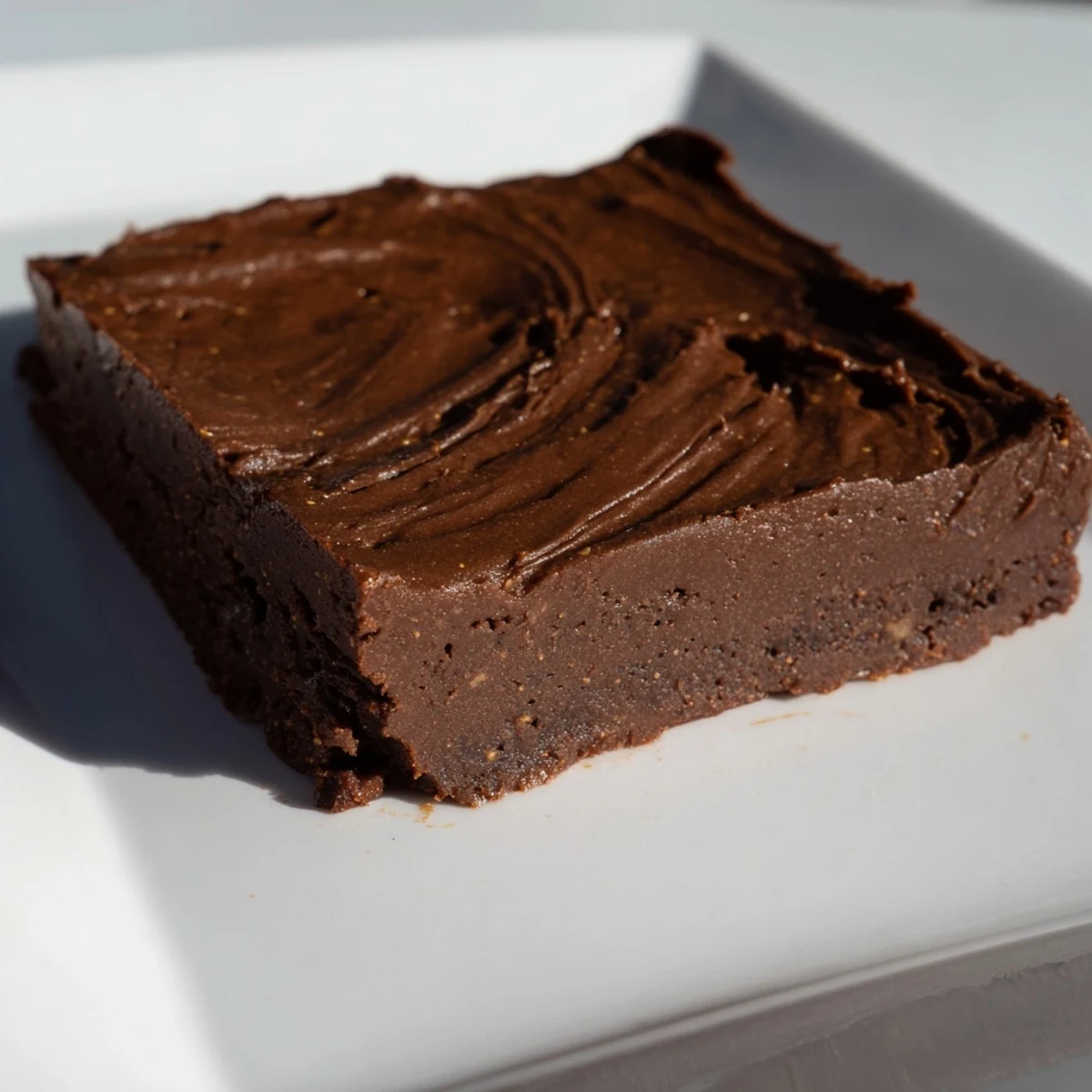 Perfectly fudgy Pumpkin Workout Brownies with a rich, inviting aroma, ideal after a workout.