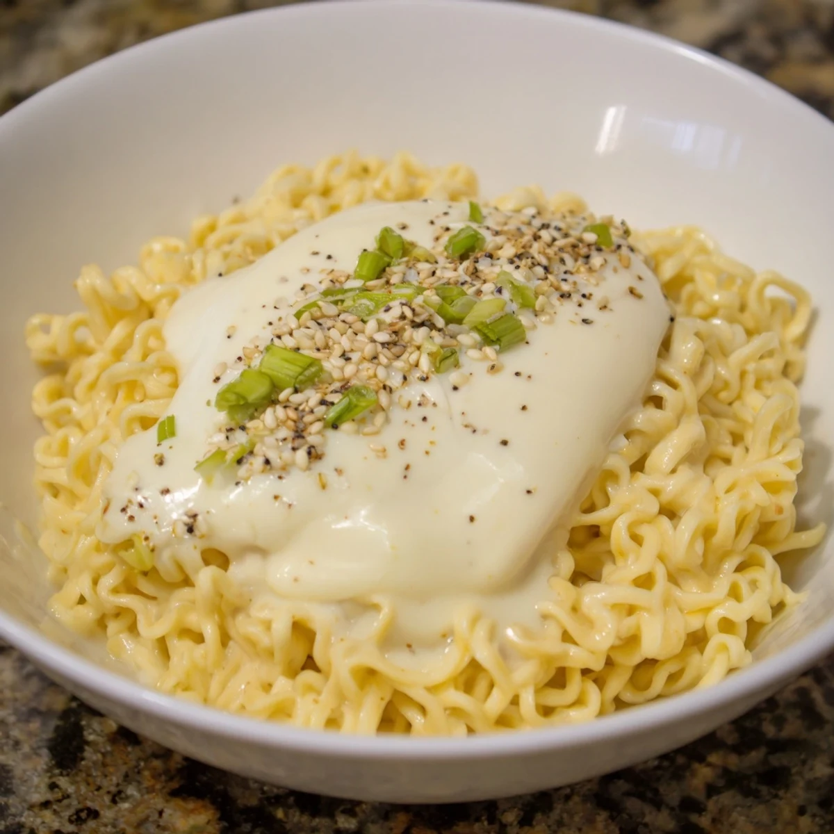 Steaming Instant Cheese Ramen Bowl, with melted cheese and a soft-poached egg, ready to eat.
