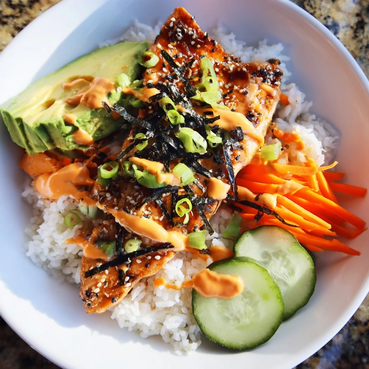 Perfectly cooked teriyaki salmon rice bowl, a harmonious blend of textures and Asian-inspired flavors, delicious!