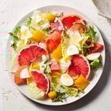 A beautifully arranged Baby Shower Pastel Palette Salad, showcasing colorful fruit and veggies for a cheerful baby shower.