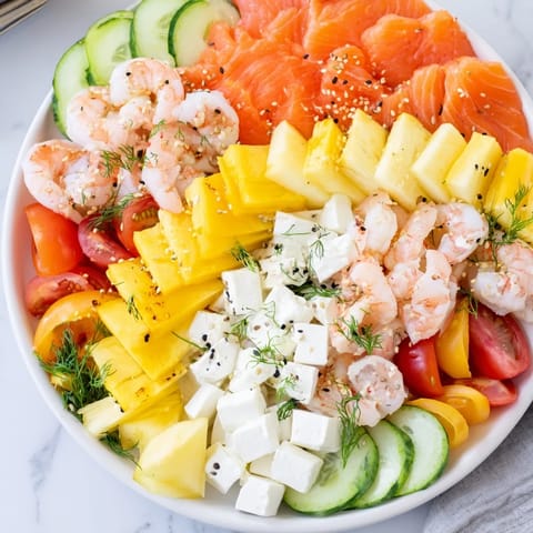 Wave Rider Surfer Snack Board featuring colorful fruits and seafood, perfect for summer gatherings.