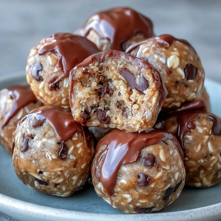 See these easy peanut butter and oat protein balls ready to grab and enjoy.